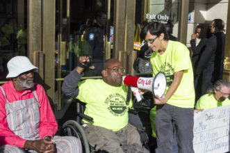 Opens popup gallery with Activists protest outside of the Boston Housing Court.
© 2013 Marilyn Humphries