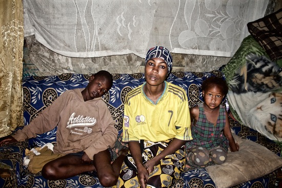 Opens popup gallery with Khadija Hamsa and two of her children.