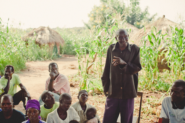 A community elder shares the history of the community land to help inform agreement on boundaries and management rules. © LEMU