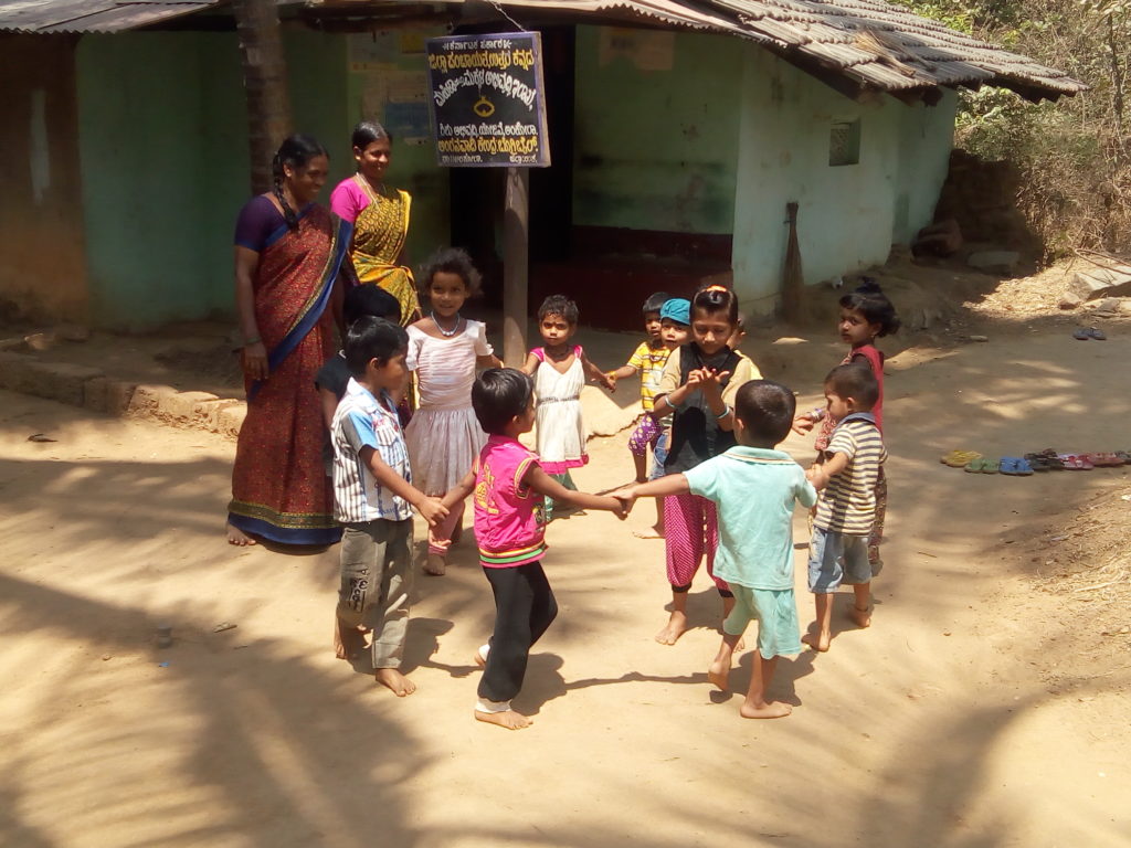 Sunita Bai, the caretaker at the Bogribeil nursery watches the children play. 
